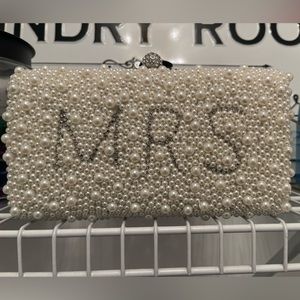 Mrs. Pearl Clutch